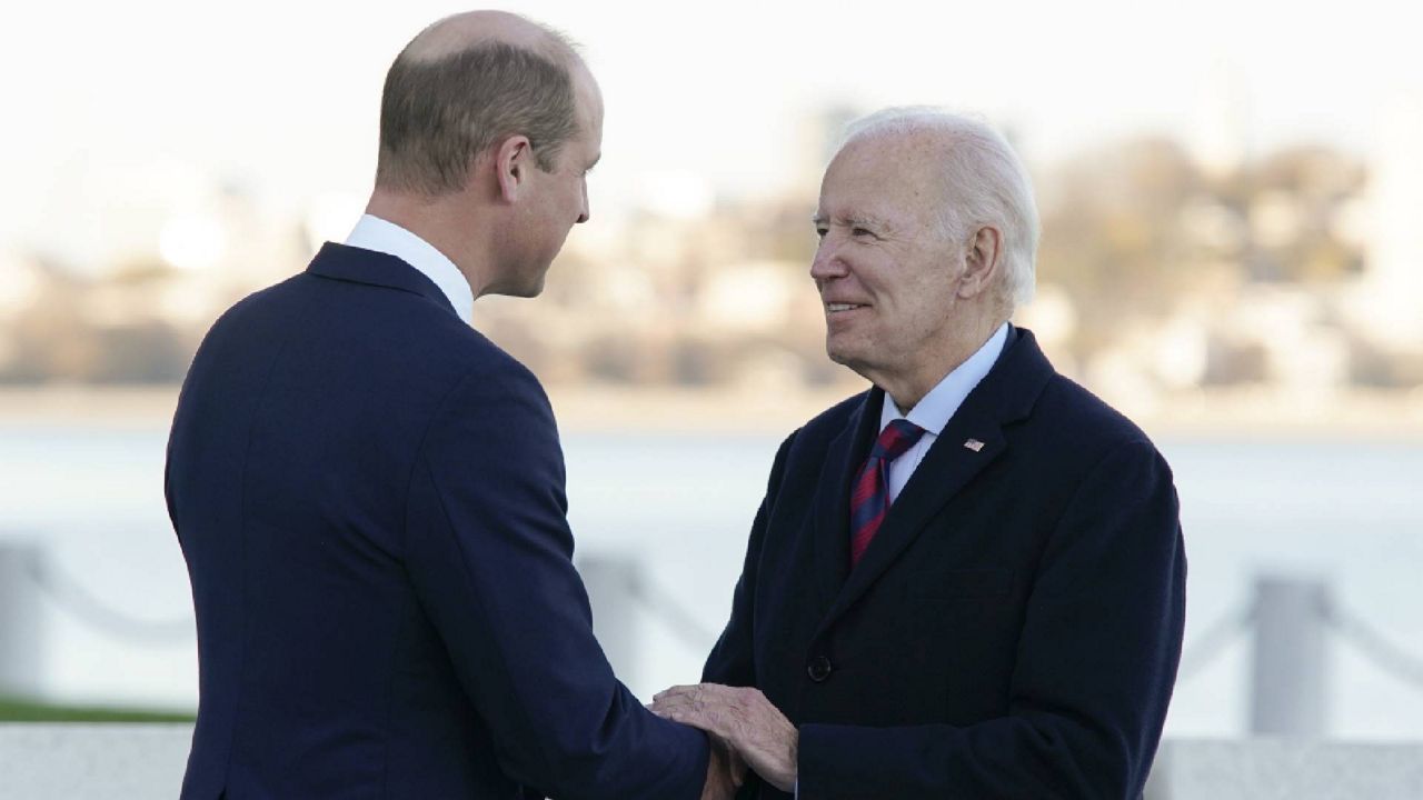 President Joe Biden shakes hands with Britain's Prince William as they meet outside the John F. Kennedy Presidential Library and Museum, Friday, Dec. 2, 2022, in Boston. (AP Photo/Patrick Semansky)