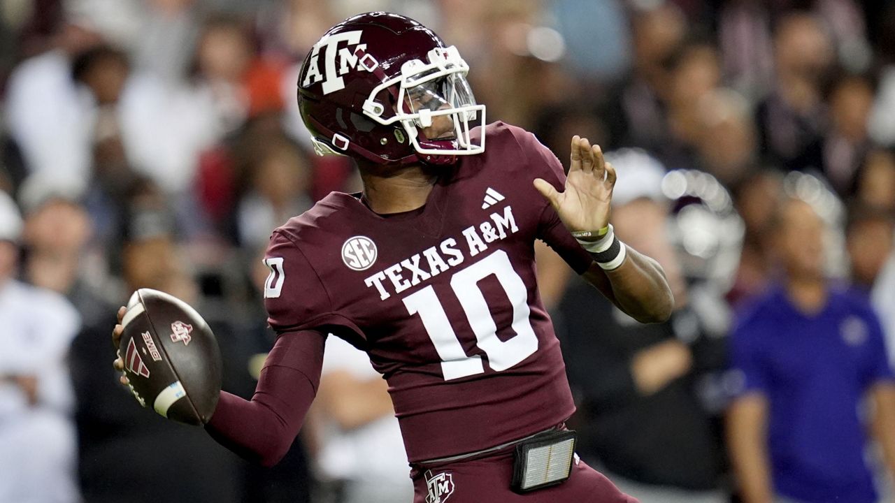 Texas A&M quarterback Marcel Reed looks to pass downfield against New Mexico State during the first half of an NCAA college football game Saturday, Nov. 16, 2024, in College Station, Texas. (AP Photo/Sam Craft)