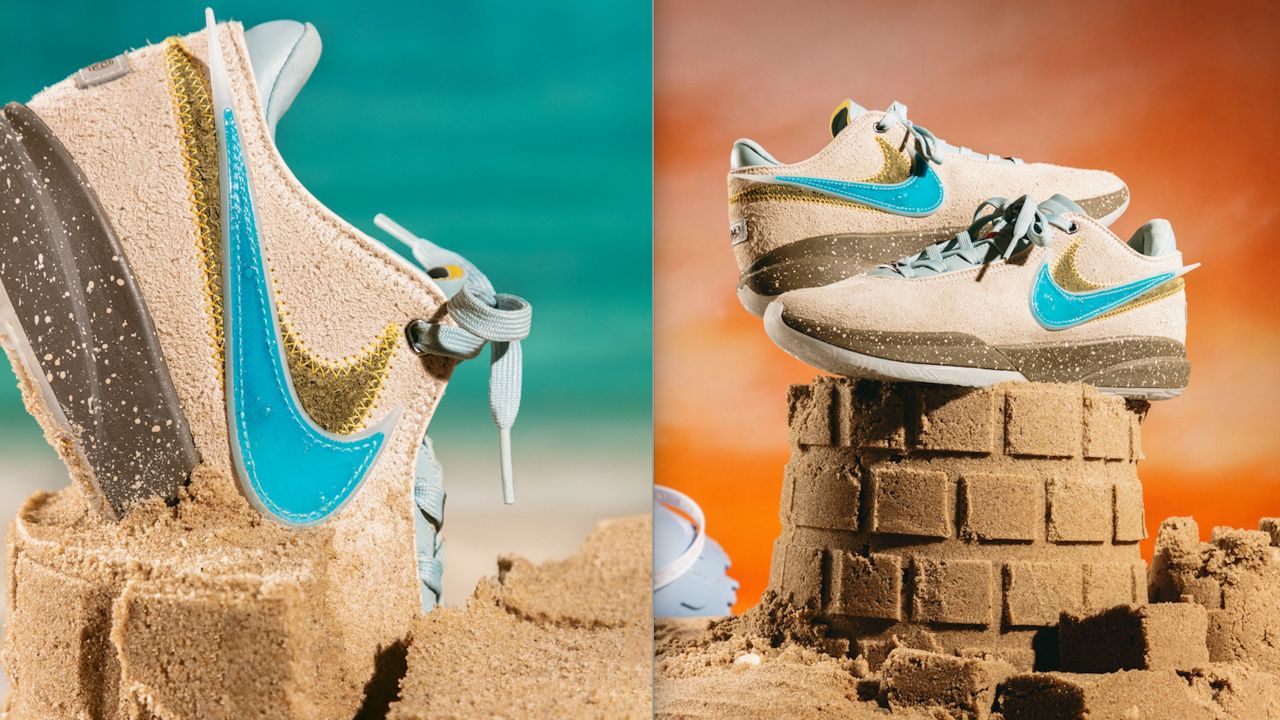 a tan and aqua-blue Nike sneaker positioned on beach sand 