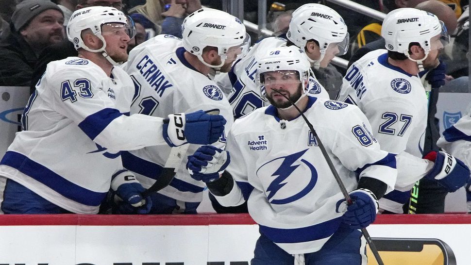 Tampa Bay forward Nikita Kucherov returns to the bench after scoring during the second period on Sunday.