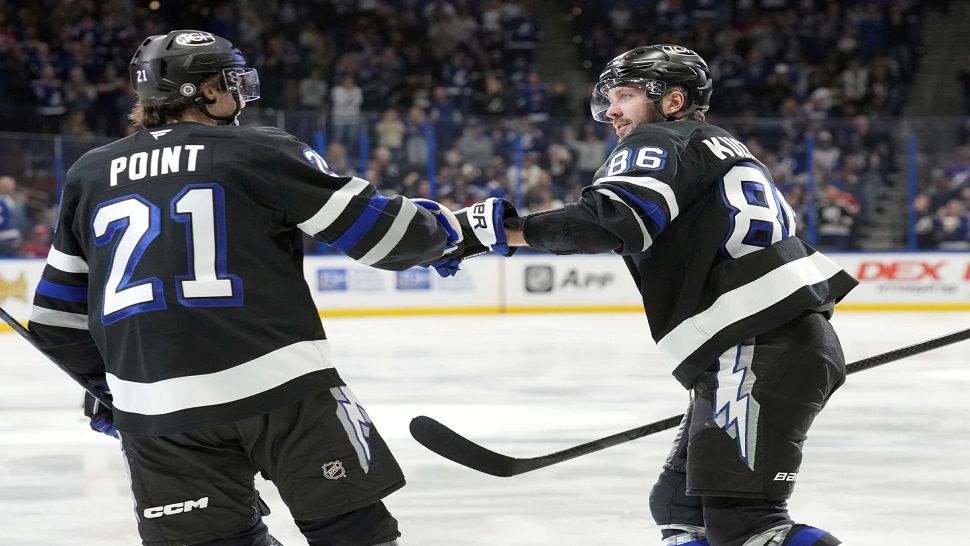 Tampa Bay forward Nikita Kucherov celebrates his second period goal with Brayden Point on Saturday night. 