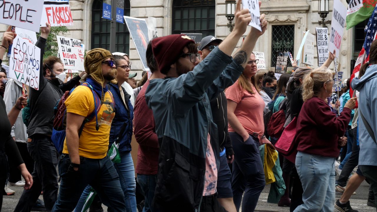 Protesters march through the streets of Cleveland on Saturday. 