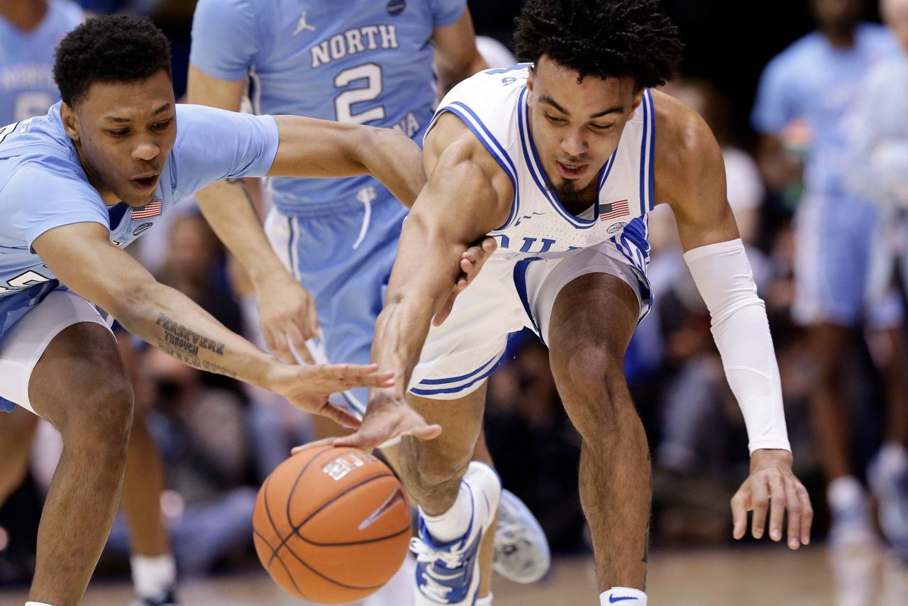 Carey, Robinson help No. 12 Duke beat rival UNC 8976