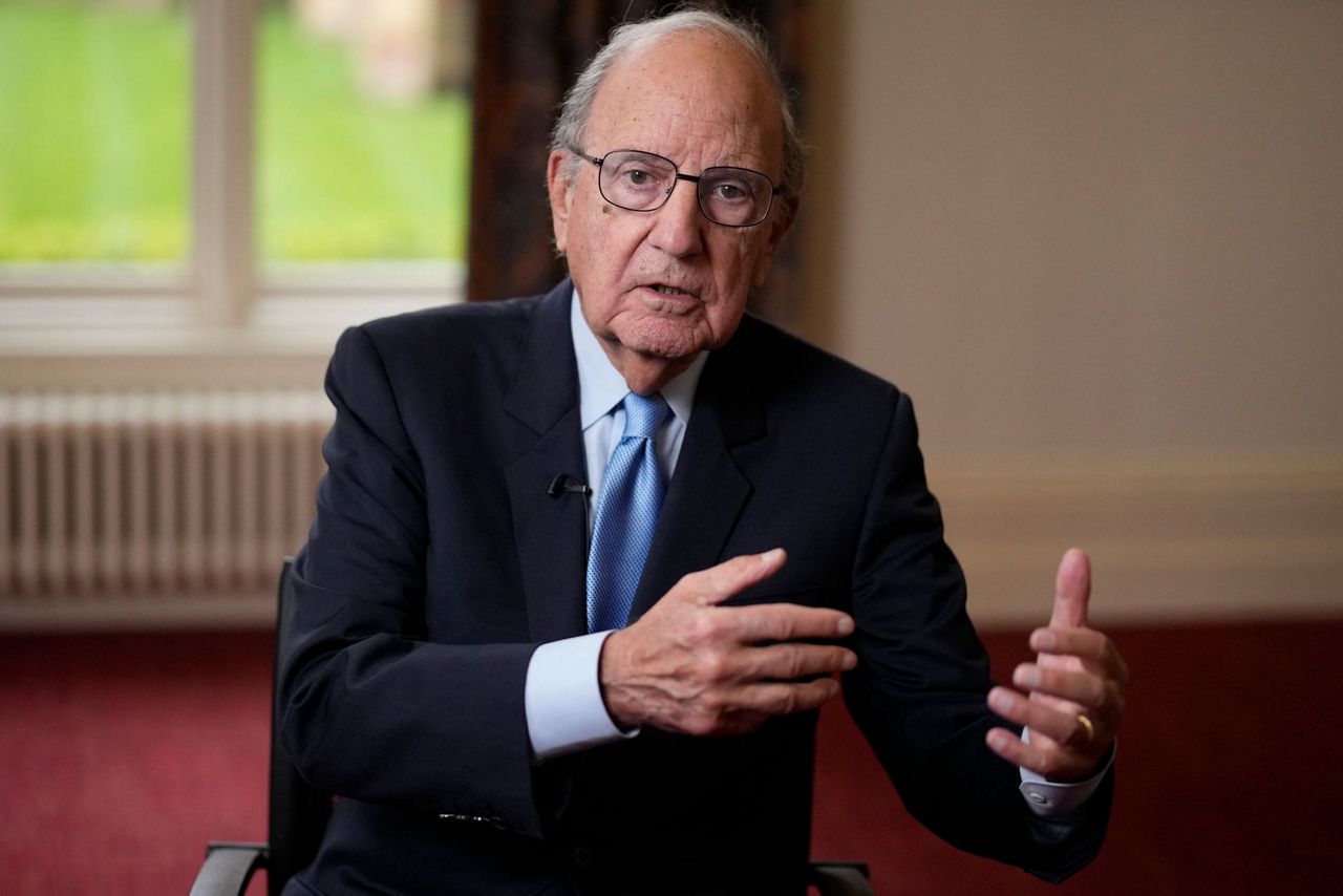 Peacemaker George Mitchell makes poignant Belfast return