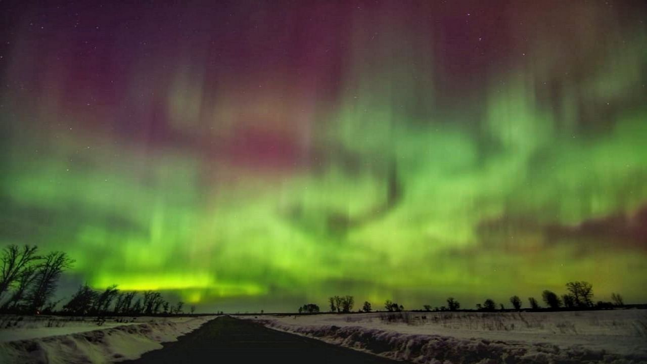 Curtains of aurora hang in the sky in Grantsburg, Wis. in March 2023. (Photo by Julie Roy)