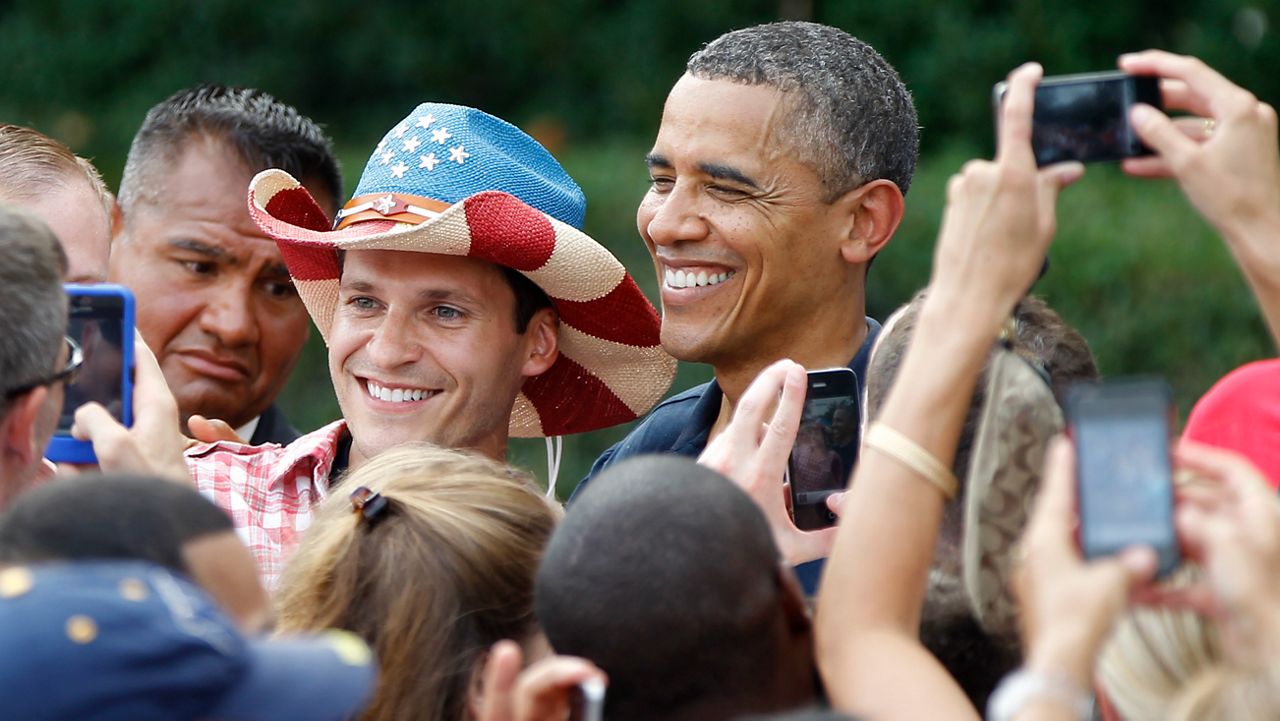 https://s7d2.scene7.com/is/image/TWCNews/Obama_Fourth_of_July_AP_National_07.02