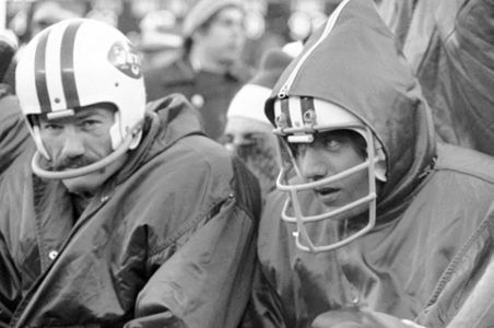 Weeb Ewbank, center, coach of the New York Jets, shows quarterback