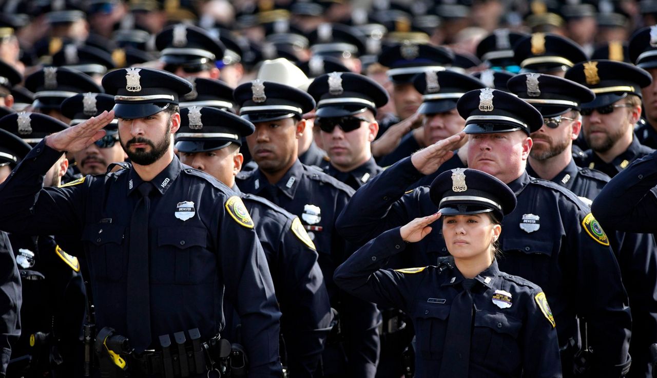 Slain Houston officer remembered for friendship, quirkiness