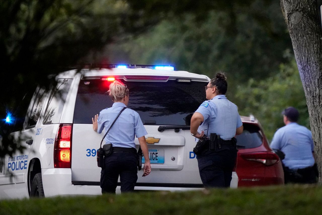 Gunman who shot 2 officers arrested after 12-hour standoff