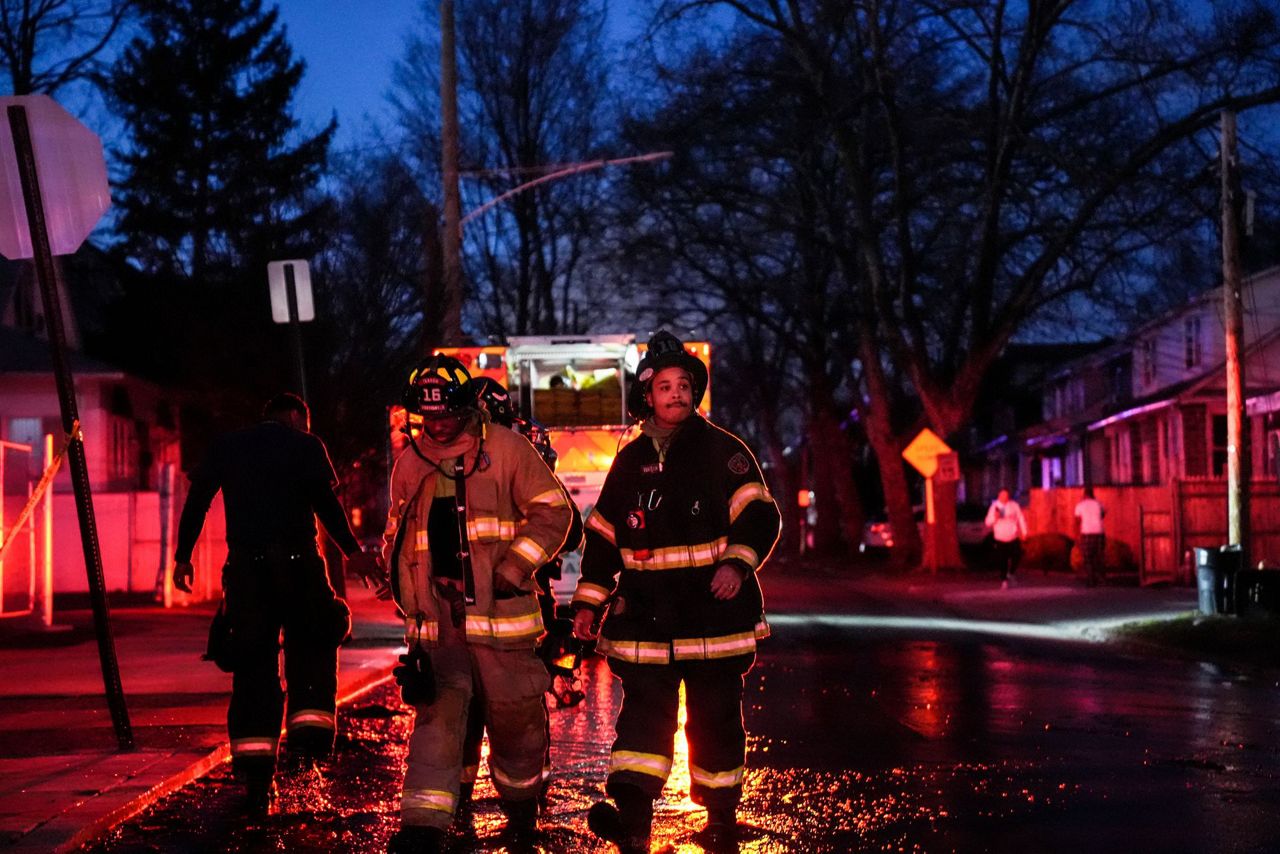 2 officers wounded by gunfire at home later seen on fire in ...