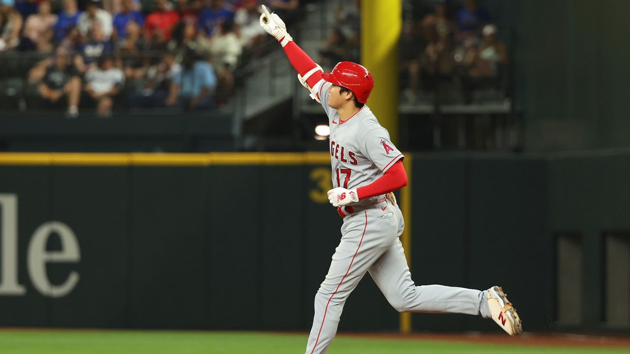 Los Angeles Angels' Shohei Ohtani runs the bases after hitting a two-run home run in the eighth inning in a baseball game against the Texas Rangers, Thursday, June 15, 2023, in Arlington, Texas. (AP Photo/Richard W. Rodriguez)