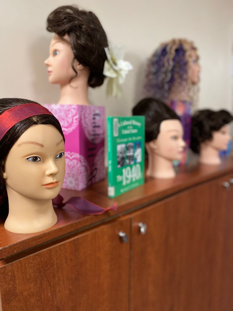 Decades of hair: Cosmetology Class Gets Creative