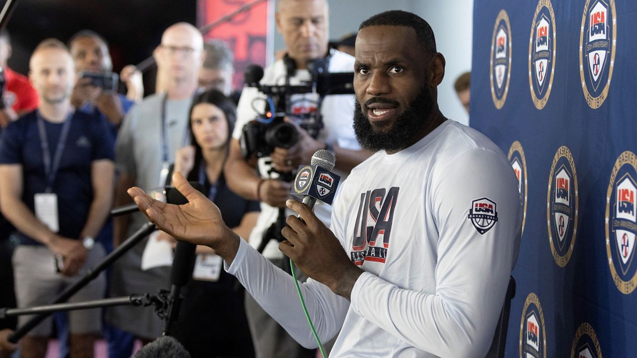 LeBron James of the Los Angeles Lakers responds to a question from a reporter during training camp for the United States men’s basketball team on July 6, 2024, in Las Vegas. (AP Photo/Steve Marcus)