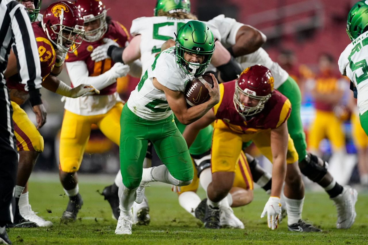 Oregon holds off USC late, grabs Pac12 title with 3124 win