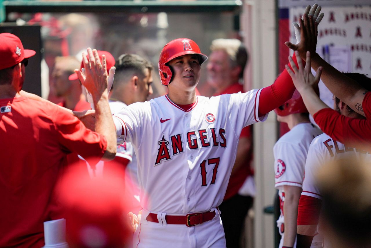 Los Angeles Angels Shohei Ohtani (17) interacts with third baseman