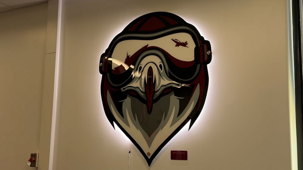 Should schools allow employees to wear apparel with past mascots?
