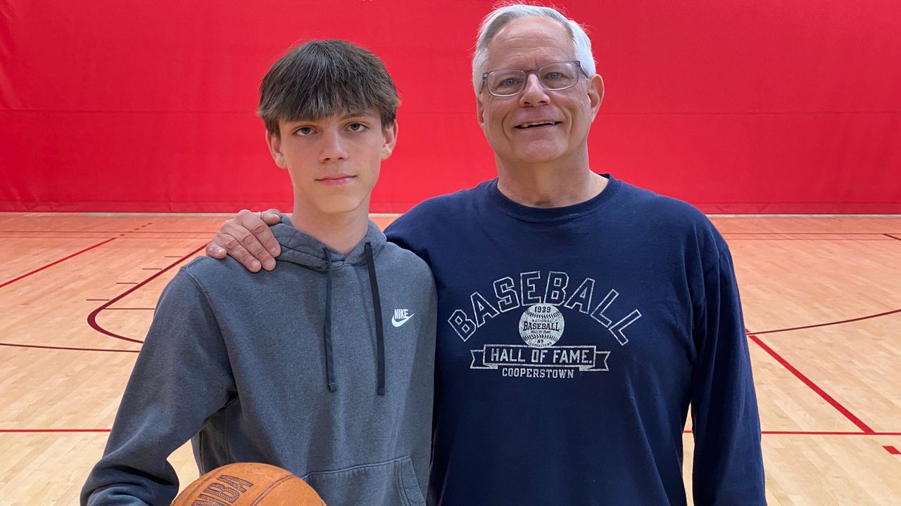 Landan Coates and Keith Wilk playing basketball
