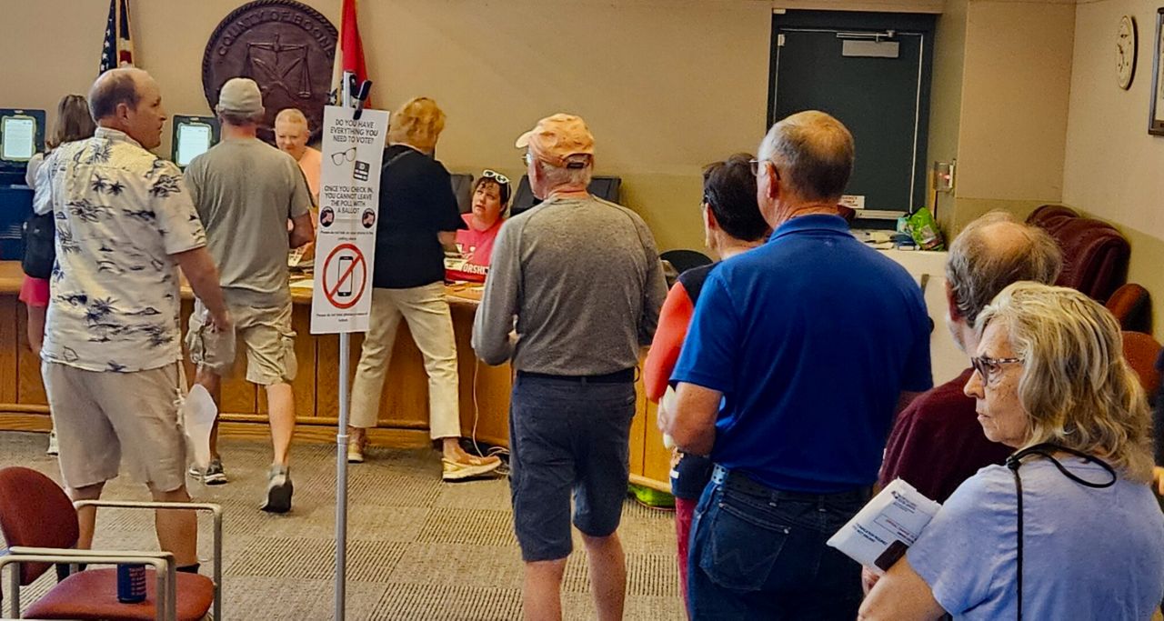 Boone County residents line up Tuesday for no-excuse absentee voting. Shortly before 10 a.m., there were 50 people in line at the Boone County Government Center in Columbia (Rudi Keller/Missouri Independent).