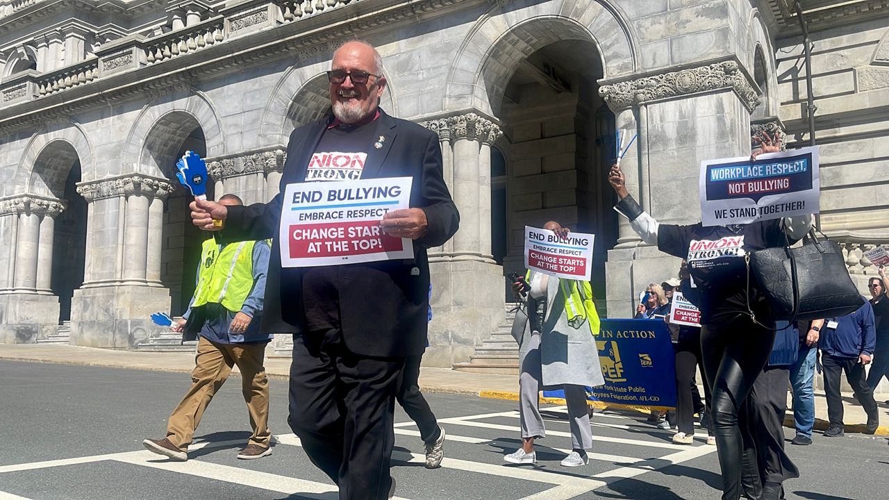 PEF members rally for law change to end workplace abuse