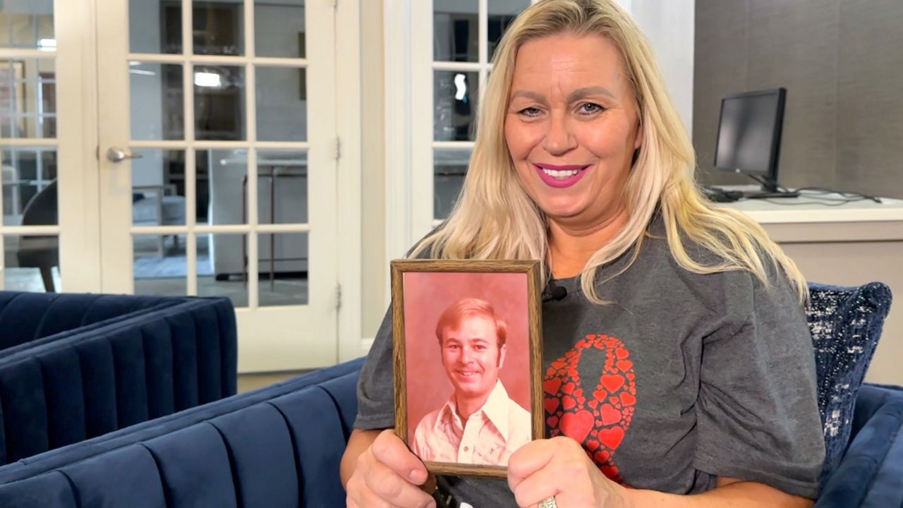 Bastrop resident Debbie Messer shares her story of loss and love by remembering her brother Randy Foster Moore who died of AIDS in 1987. (Spectrum News 1/Lupe Zapata)