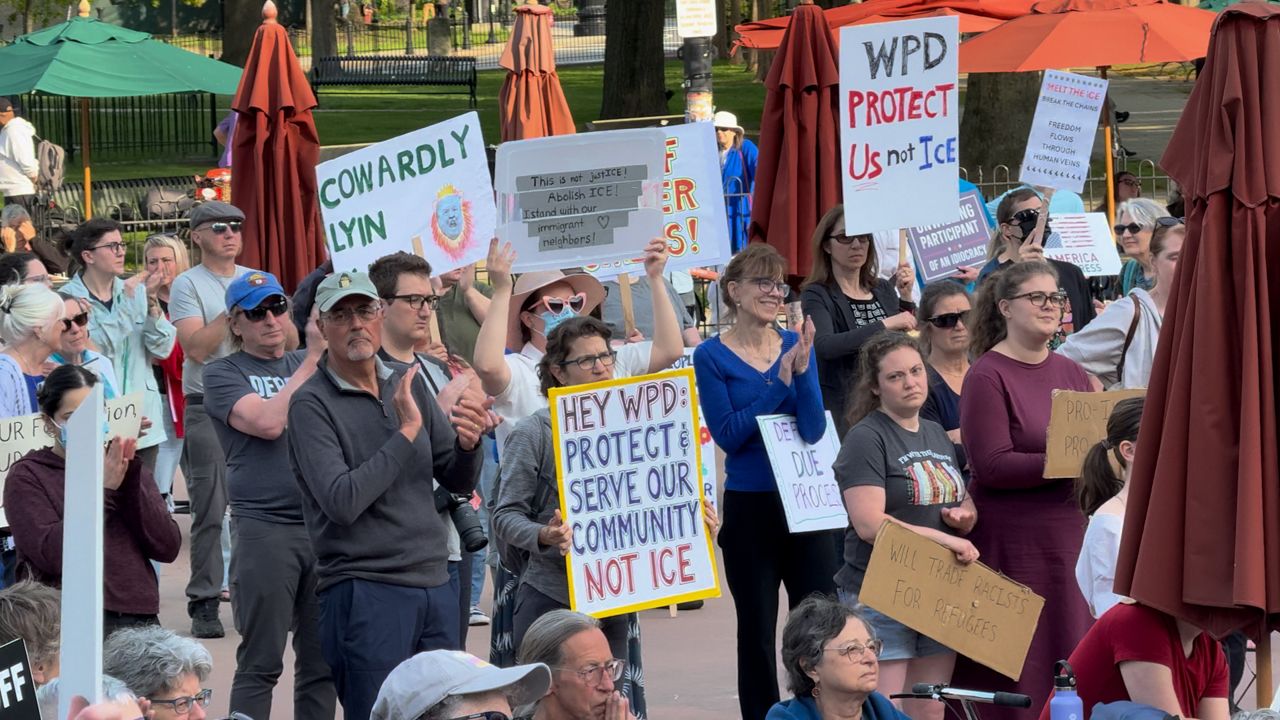 Protestors gather outside Worcester City Hall on Tuesday. (Spectrum News 1/Devin Bates)