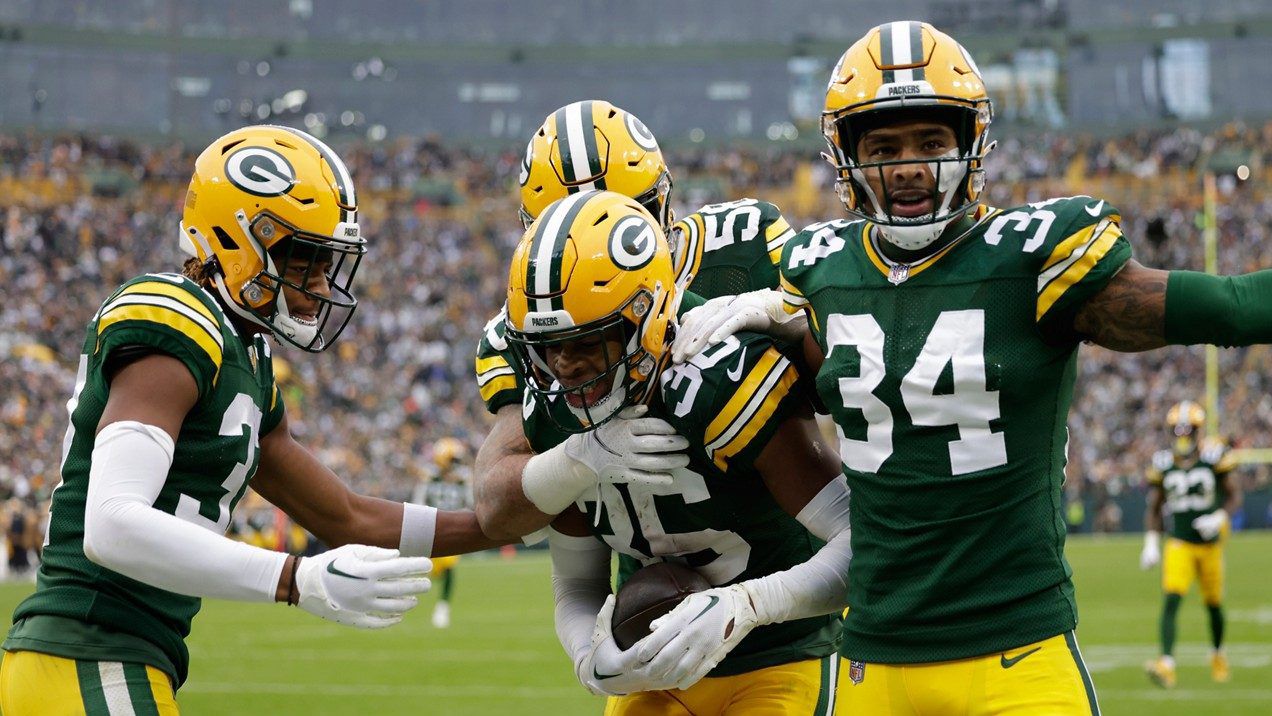 Green Bay Packers safety Anthony Johnson Jr. (36), front center, celebrates with teammates after intercepting a pass during the second half of an NFL football game against the Los Angeles Rams, Sunday, Nov. 5, 2023, in Green Bay, Wis. (AP Photo/Matt Ludtke)