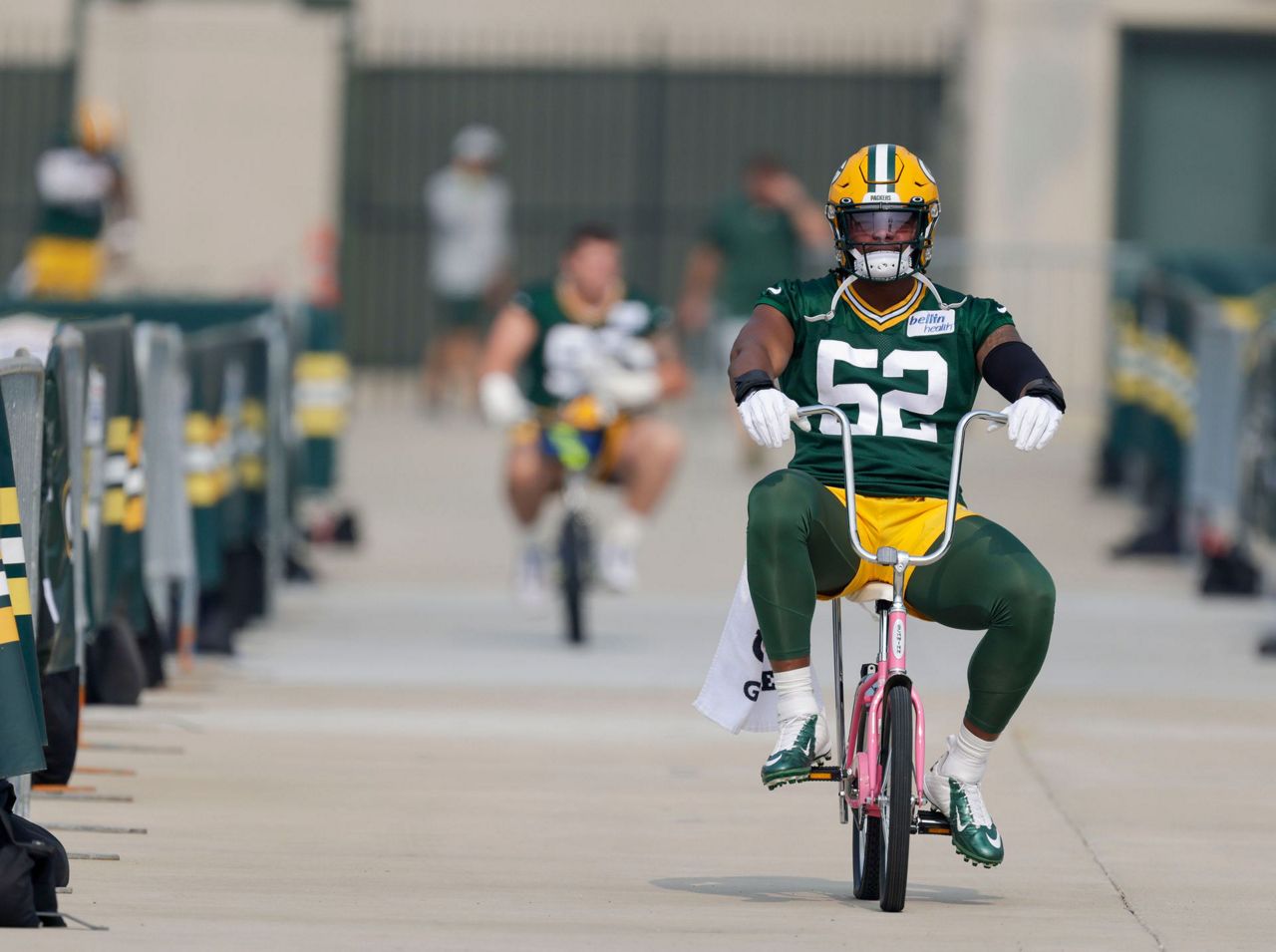 Photos: Players and fans bike to Packers training camp practice