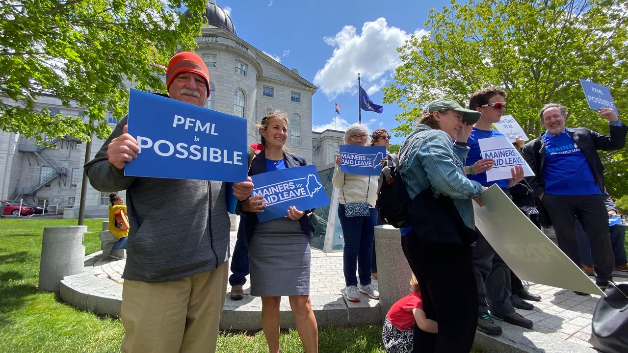 Advocates rallied at the State House last week to urge lawmakers to support a new paid family and medical leave program, (Spectrum News/Susan Cover)