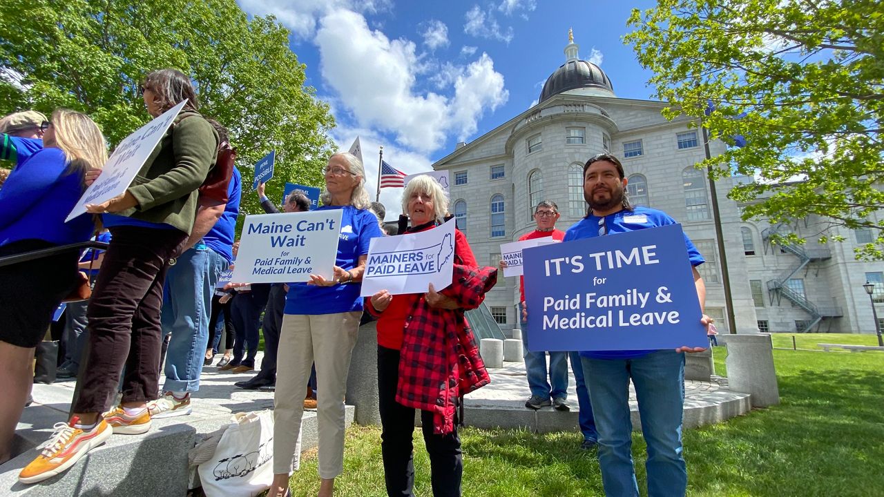 Supporters of a new paid family and medical leave program rallied at the State House on Thursday. (Susan Cover/Spectrum News)