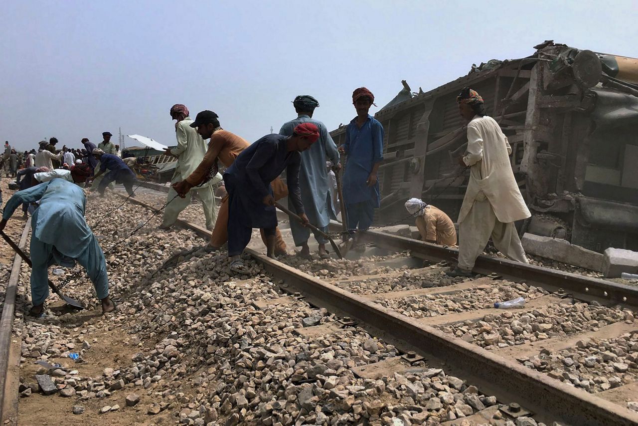 Engineers partially restore rail service after train derailed in ...