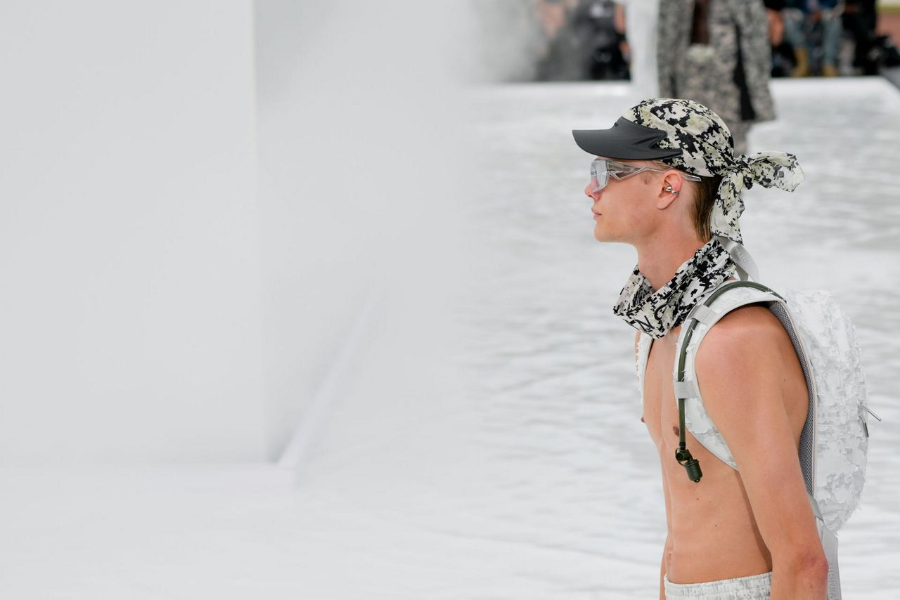 Givenchy models walk on water in Paris Fashion Week