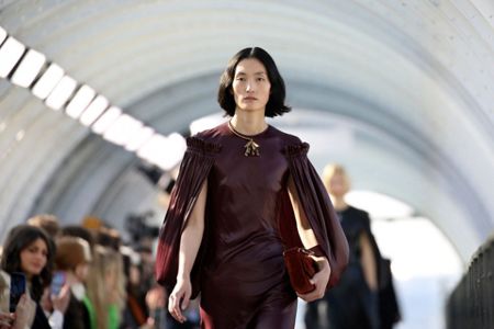 A model wears a creation as part of the Louis Vuitton Ready To Wear  Fall/Winter 2022-2023 fashion collection, unveiled during the Fashion Week  in Paris, Monday, March 7, 2022. (Photo by Vianney