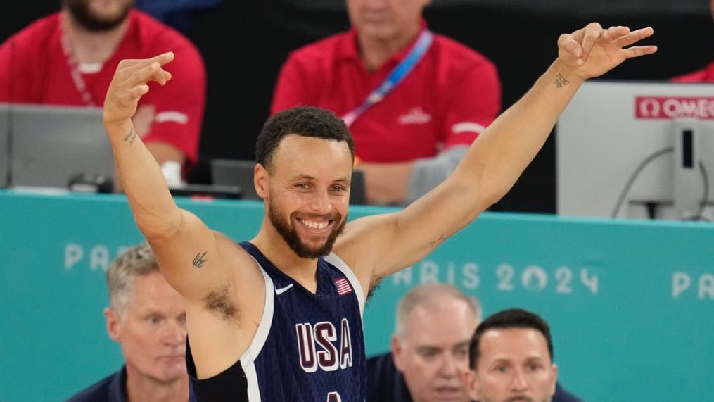 United States' Stephen Curry (4) reacts during a men's gold medal basketball game at Bercy Arena at the 2024 Summer Olympics, Saturday, Aug. 10, 2024, in Paris, France. (AP Photo/Michael Conroy)