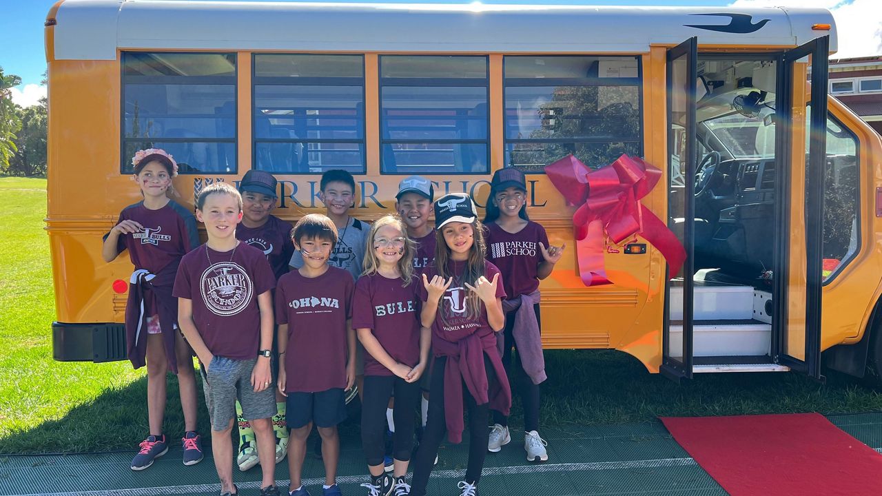 The two new buses in Parker School's fleet are the first equipped with seat belts and air conditioning. (First Hawaiian Bank)