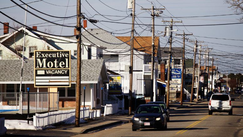 Cars roll by on East Grand Avenue in Old Orchard Beach pictured in April 2015. (Bangor Daily News/Troy R. Bennett)