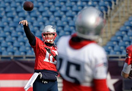 In this Dec. 2, 2018, file photo, New England Patriots quarterback Tom Brady  celebrates a touchdown during an NFL football game against the Minnesota  Vikings at Gillette Stadium in Foxborough, Mas …