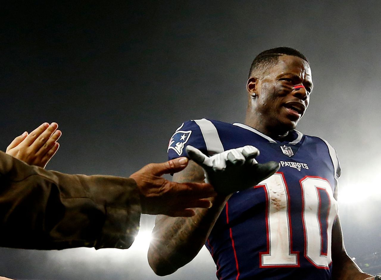 In this Dec. 2, 2018, file photo, New England Patriots quarterback Tom Brady  celebrates a touchdown during an NFL football game against the Minnesota  Vikings at Gillette Stadium in Foxborough, Mas …