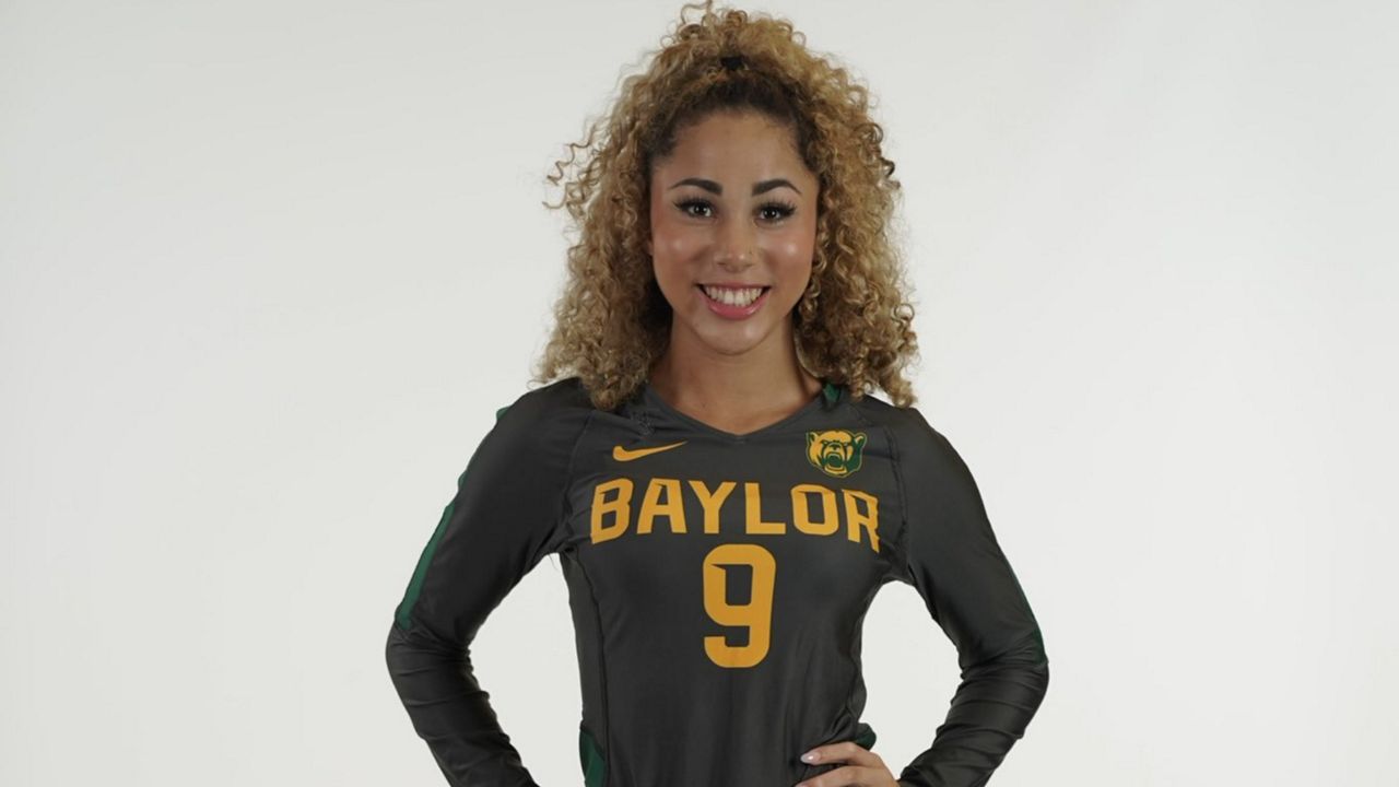 High school cheerleader Payton Washington, now committed to compete for Baylor University's acrobatics & tumbling team, seeks normalcy after a shooting incident. (Baylor University Athletics) 