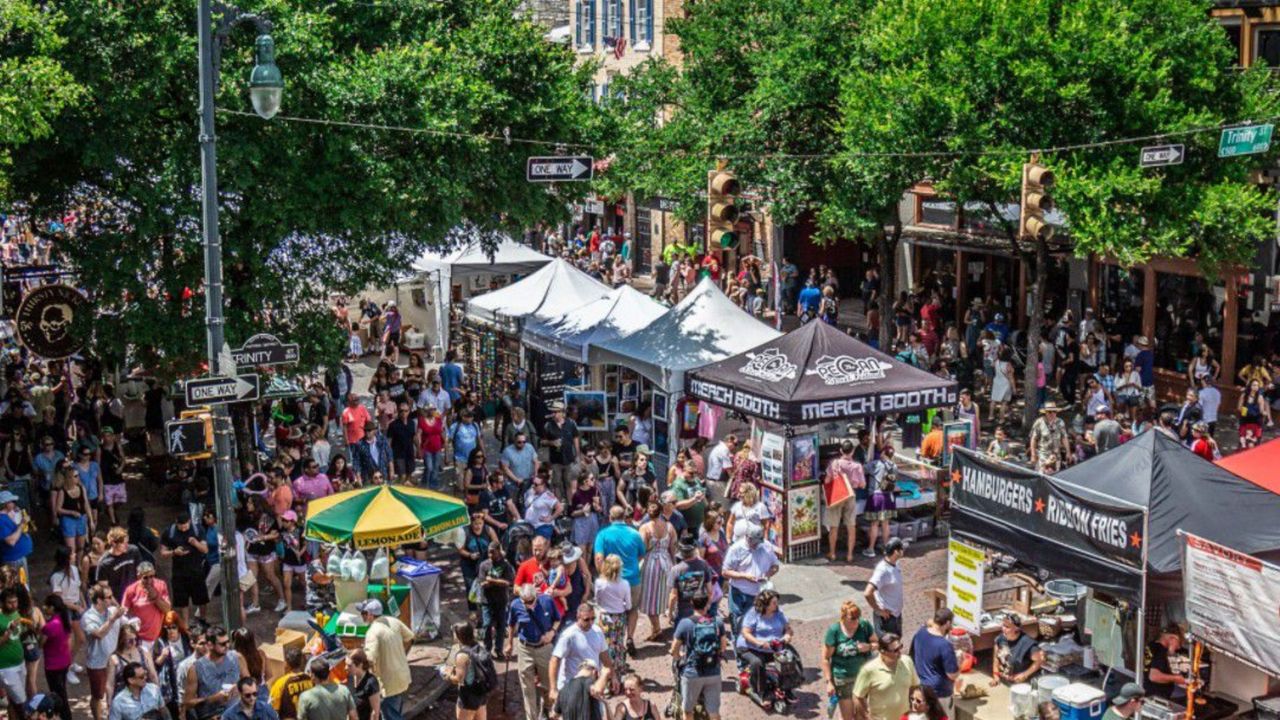 People gathered at the Pecan Street Festival. 