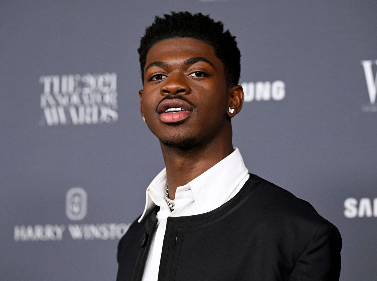 Lil Nas X charged with attacking police officers as he walked naked on ...