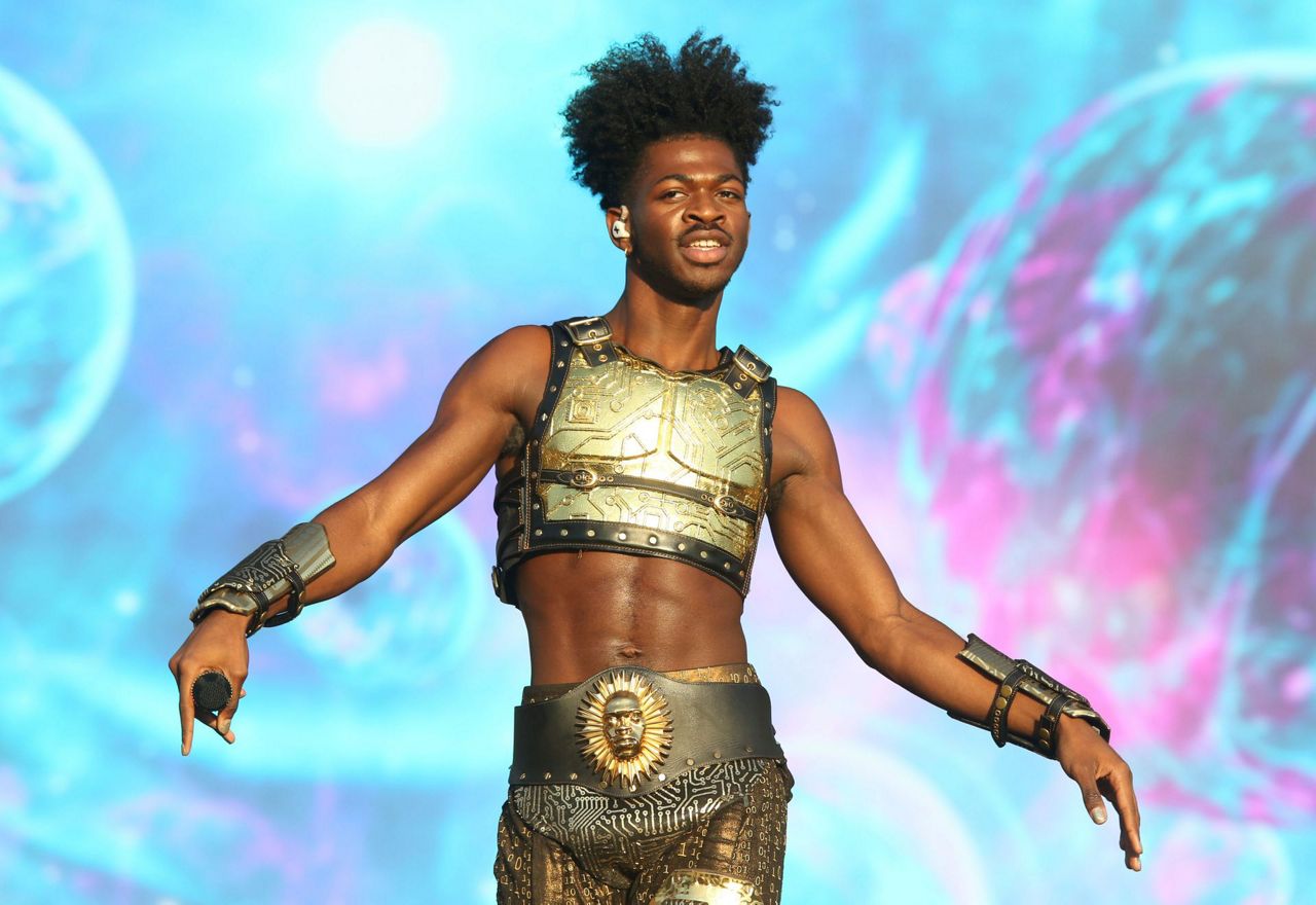 Lil Nas X charged with attacking police officers as he walked naked on ...