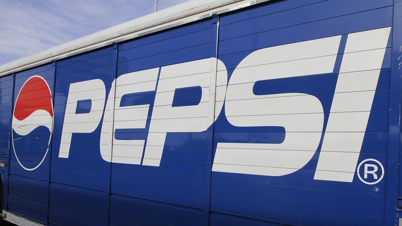 The Pepsi logo is seen on a delivery truck in Springfield, Ill. (AP Photo/Seth Perlman, File)