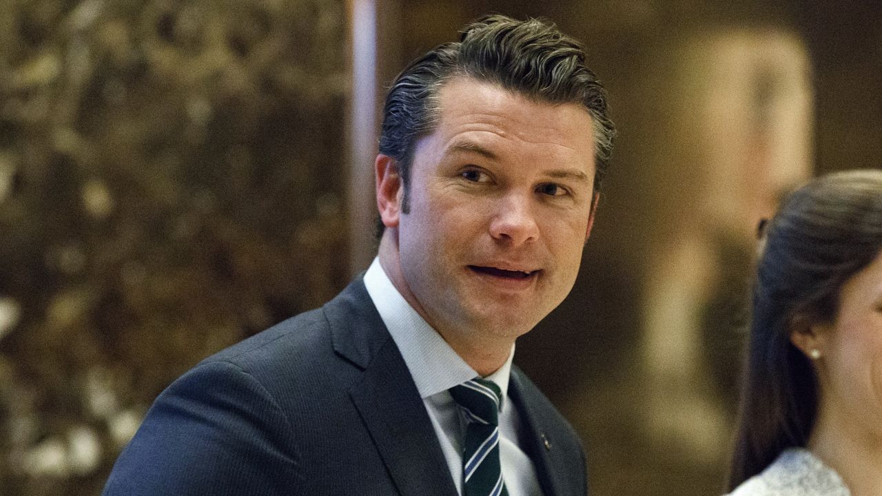 Pete Hegseth walks to an elevator for a meeting with President-elect Donald Trump at Trump Tower in New York, Dec. 15, 2016. (AP Photo/Evan Vucci, File)