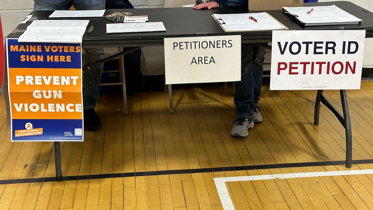 Voters signed petitions on Tuesday at polling places across the state in support of 2025 ballot measures. (Spectrum News/Susan Cover)