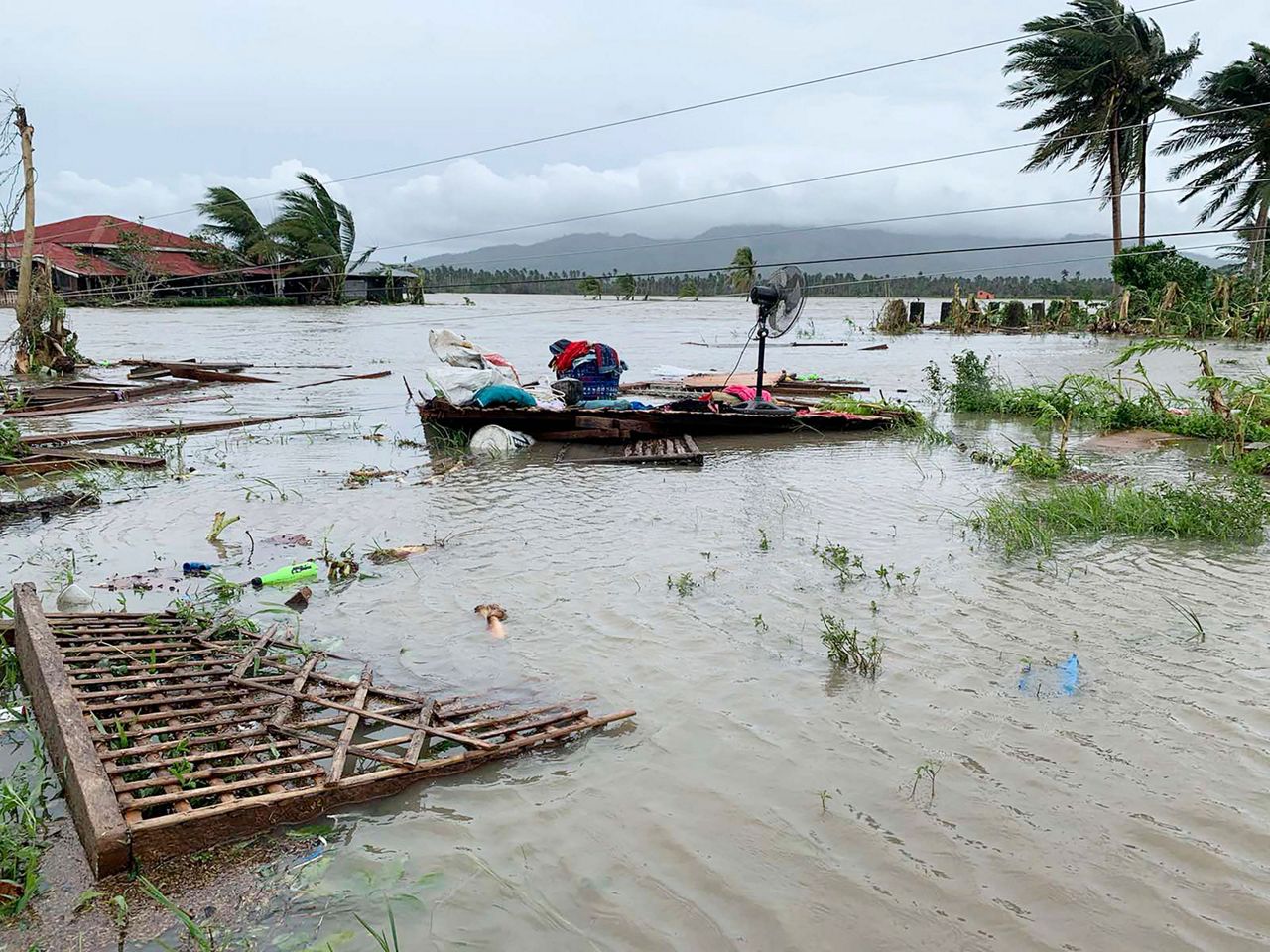 Typhoon displaces thousands, floods villages in Philippines