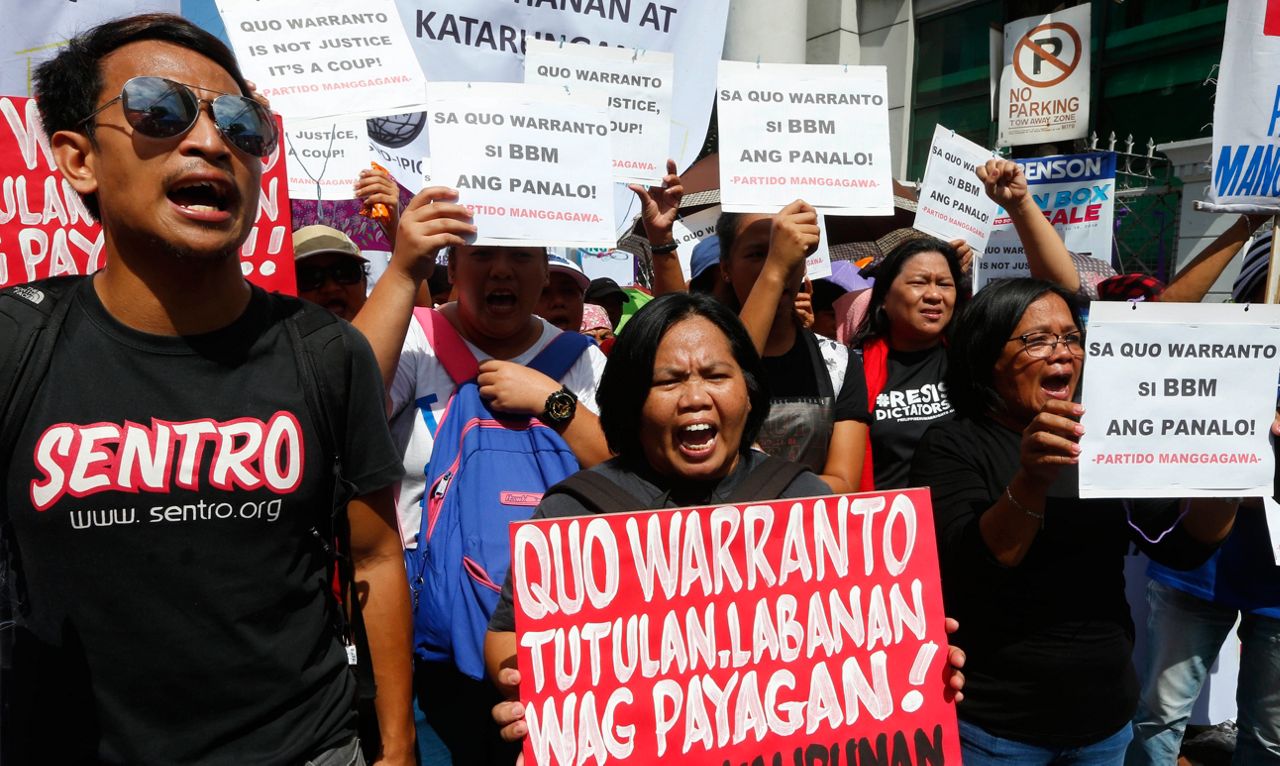 Protesters warn democracy at risk if Filipino justice ousted