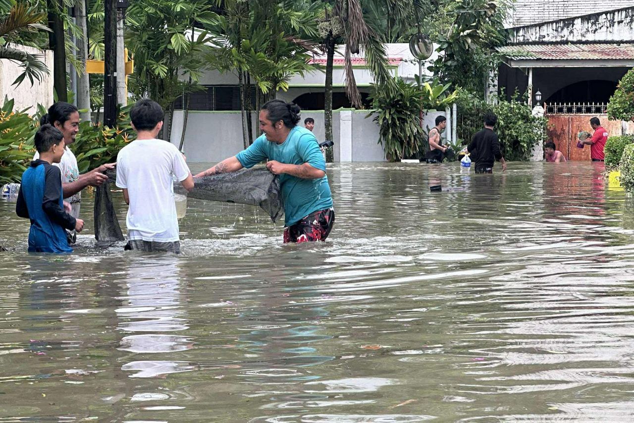 Tens of thousands of people evacuate to safety as typhoon approaches ...