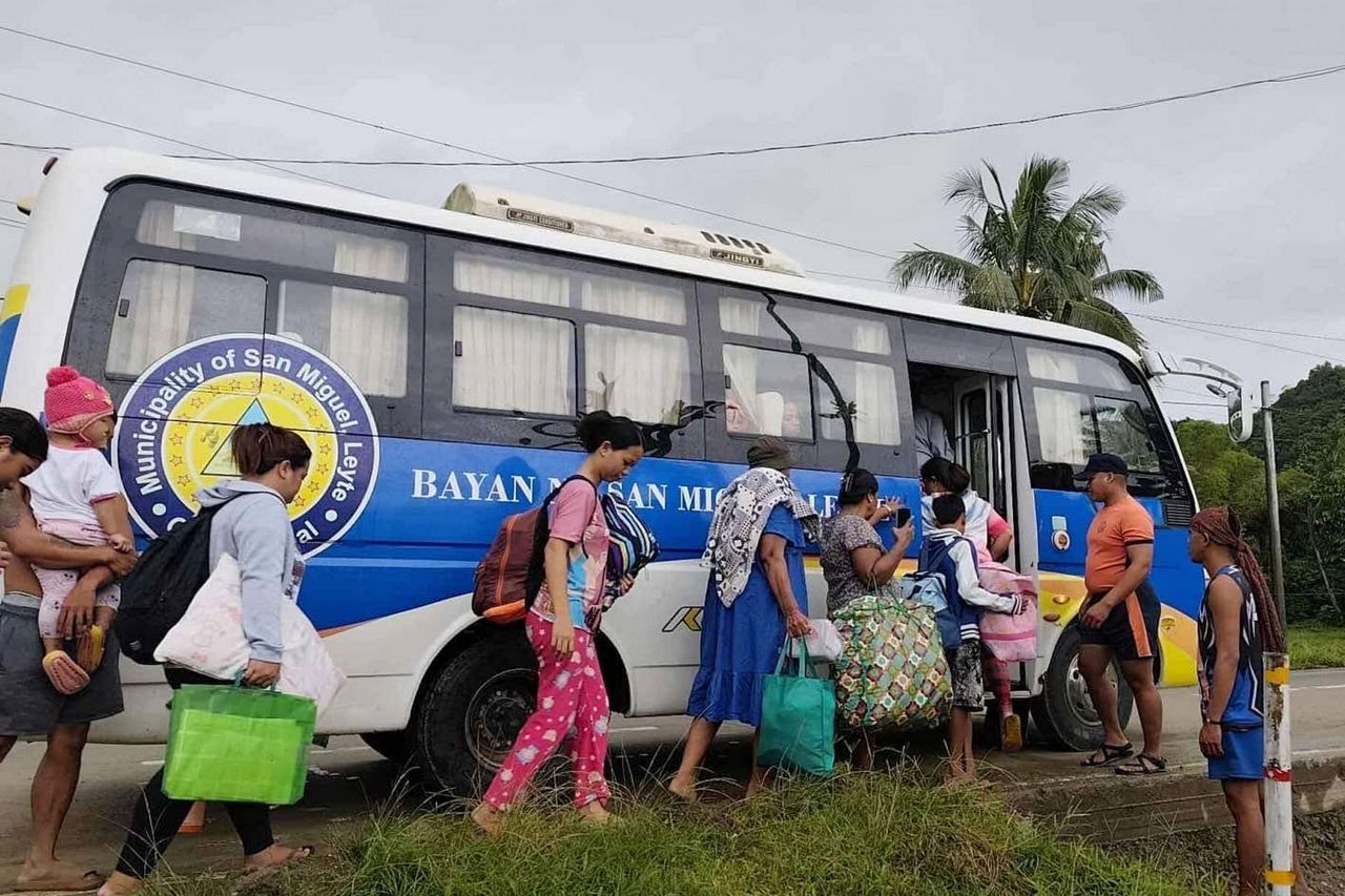 Tens of thousands of people evacuate to safety as typhoon approaches ...