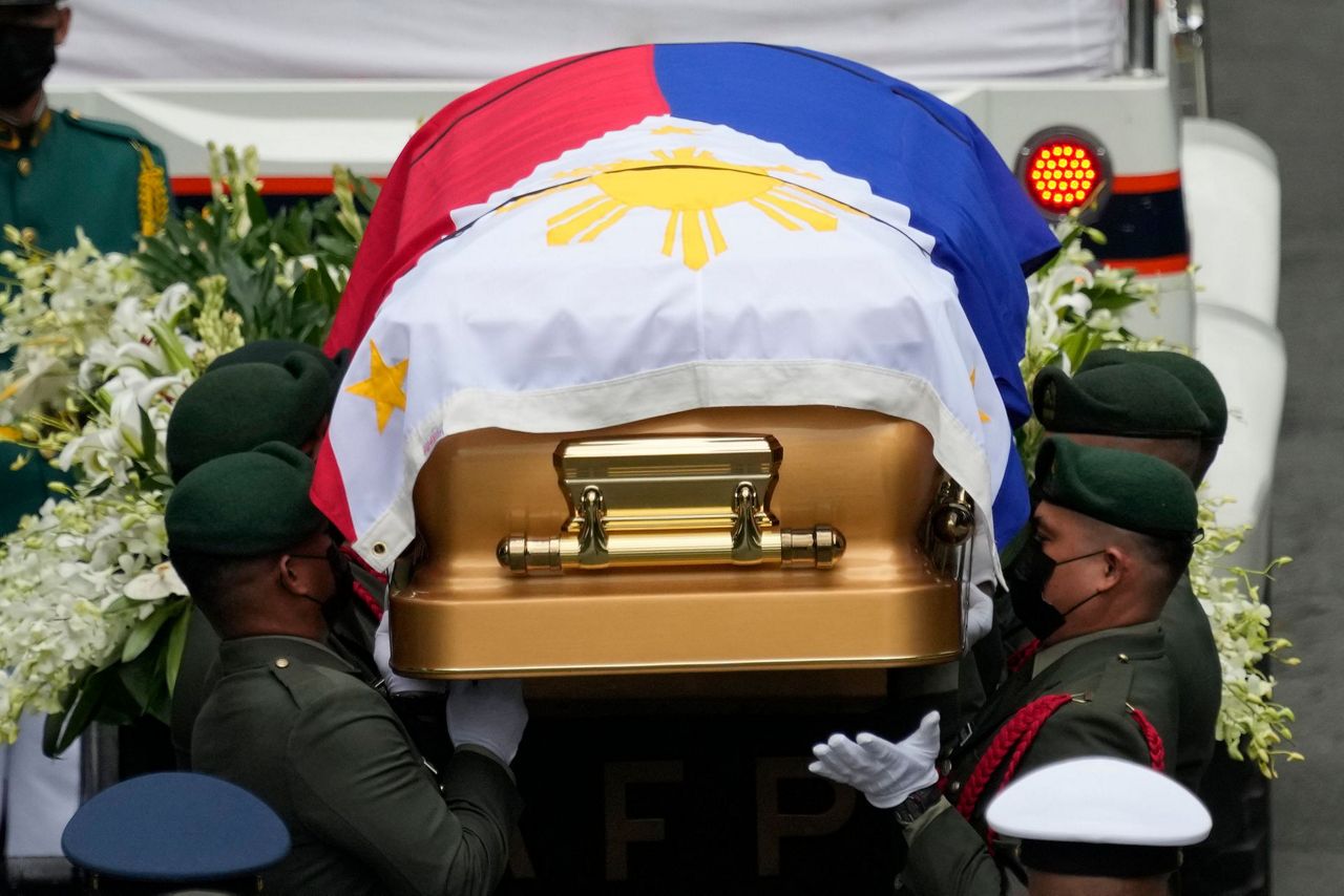 Ex-Philippine leader and democracy defender Ramos is buried