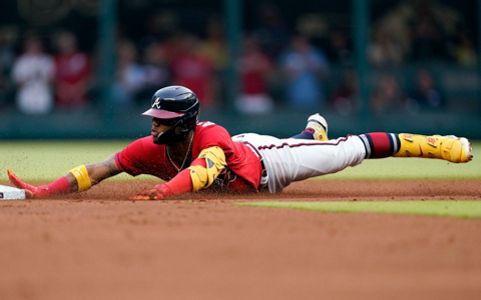 Pittsburgh Pirates' Daniel Vogelbach reacts after a called third strike by  home plate umpire Larry Vanover during the first inning of the team's  baseball game against the Atlanta Braves on Friday, June